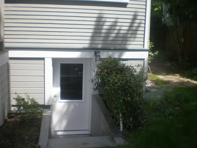 separate apartment entrance at the back of the house