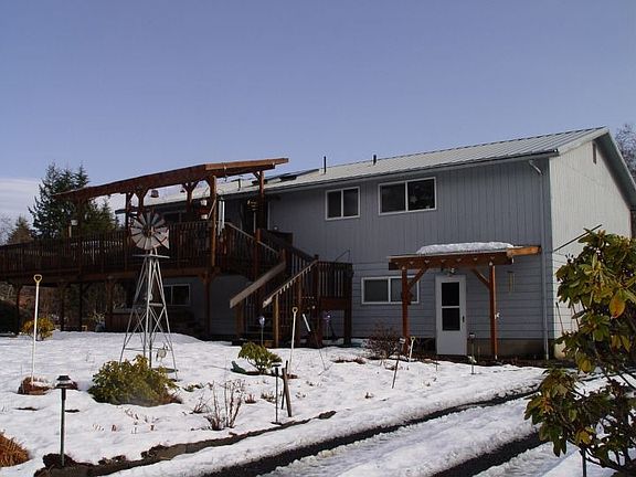 Back of the house w/ attached 2-car garage