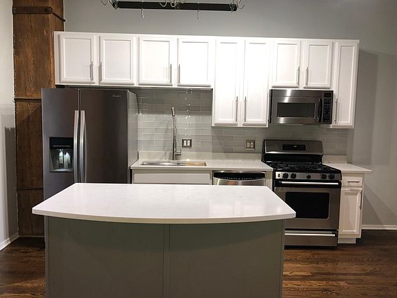 Kohler Kitchen Sink with sliding cutting board and dryer racks included