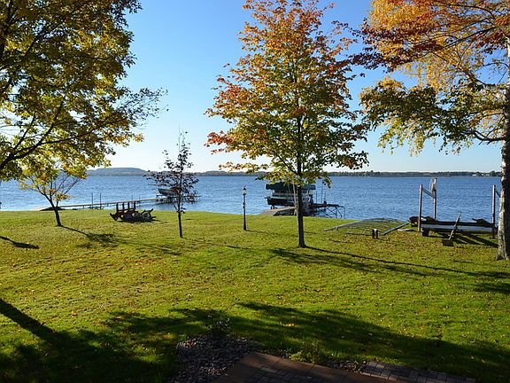 Lake view looking South : Enjoy 50 ft. of prime North-West Shawano Lake shore, with hard sandy front