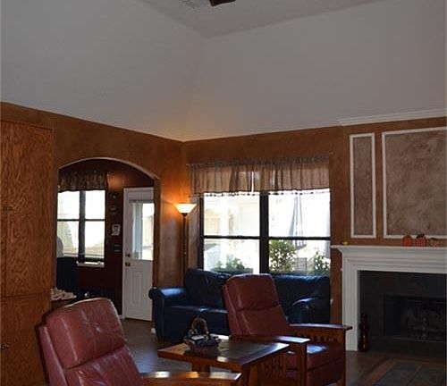 Living room as you look toward backyard. Notice the high ceilings!