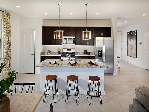 Kitchen in the Cedar Floorplan modeled at Hurley Ranch