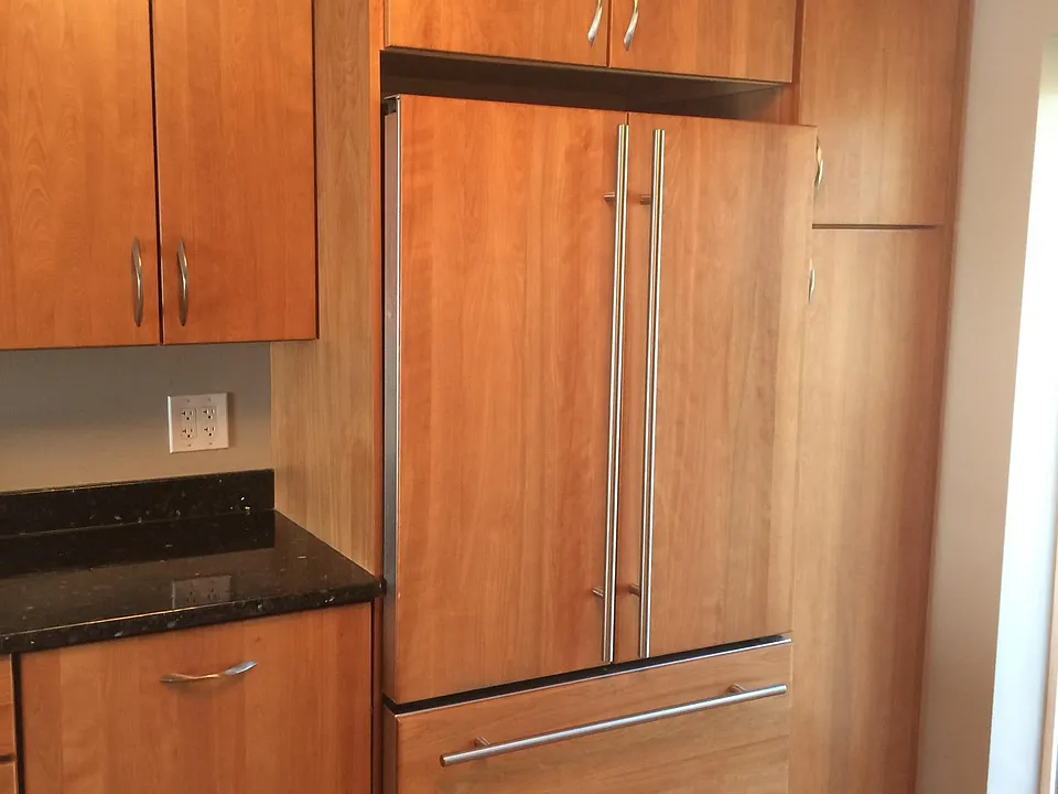 Custom cabinets with pullout pantry. 