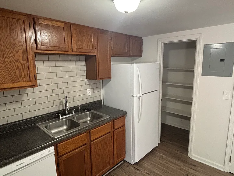 Kitchen with view of the pantry