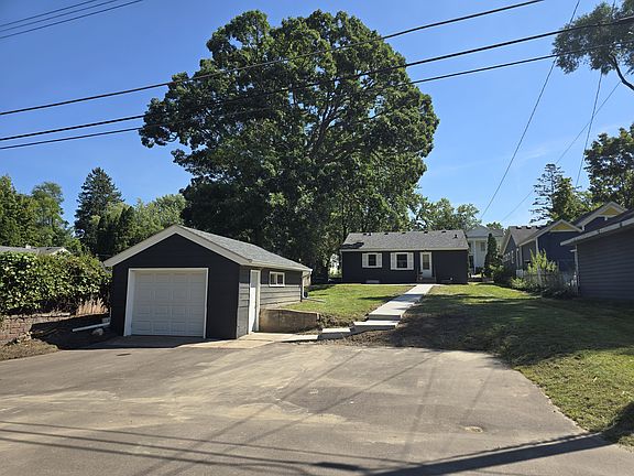 Back yard, garage, parking area