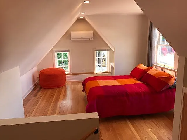 Lovely loft bedroom. Great light, original fir floors fully refinished, mini-split AC keeps things cool