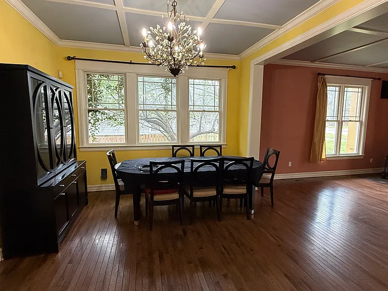 Formal Dining room with buffet cabinet and large table and chairs