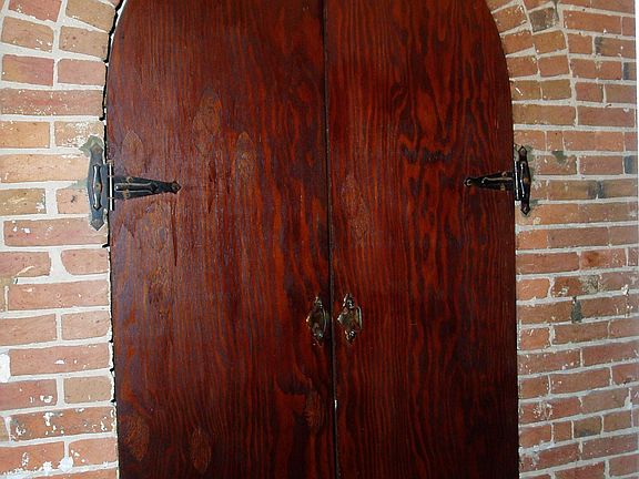 Exposed Brick and arched doorways