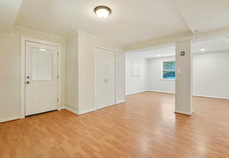 Main / Entry level Family Room or Bedroom #4 with access to garage