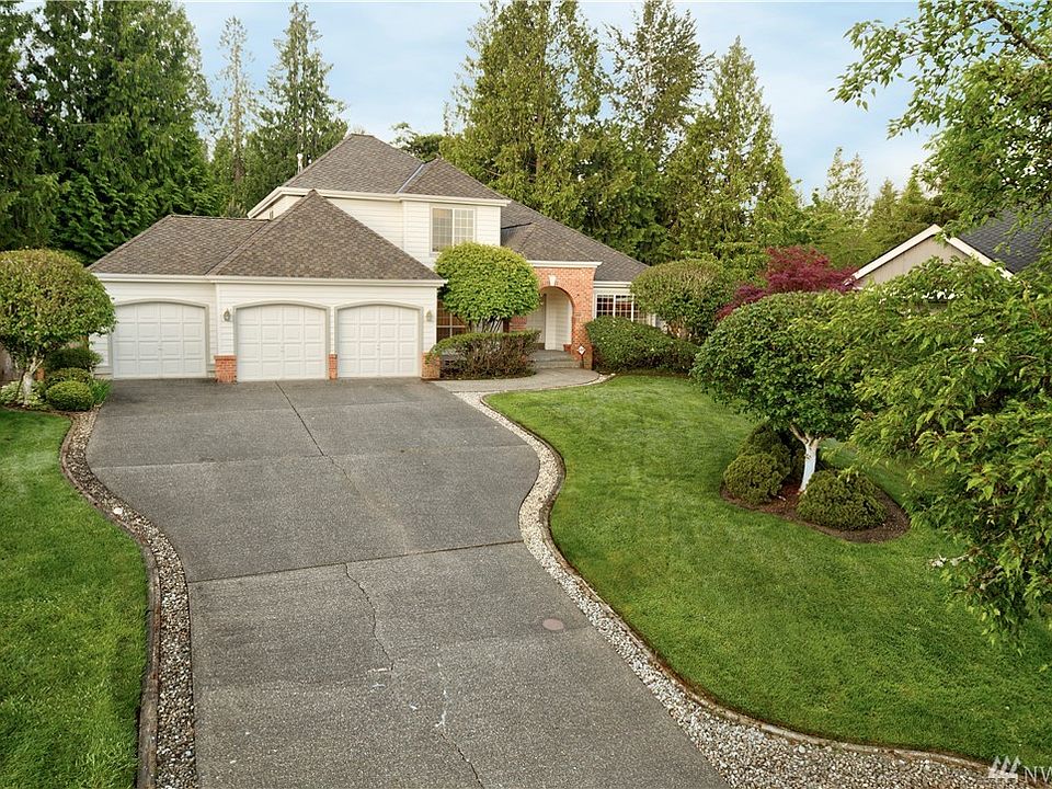 Beautiful lot and curb appeal with the long driveway entrance