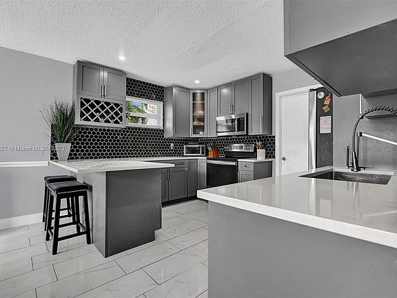 5th image of 8211 SW 3rd Pl