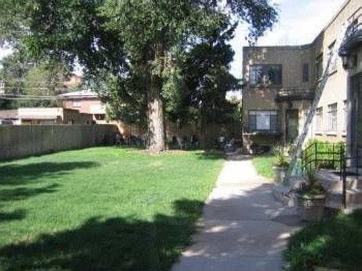Back of yard with bbq and patio area
