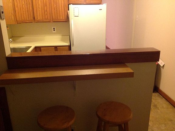 The kitchen entrance is set up to hide the cooking area from