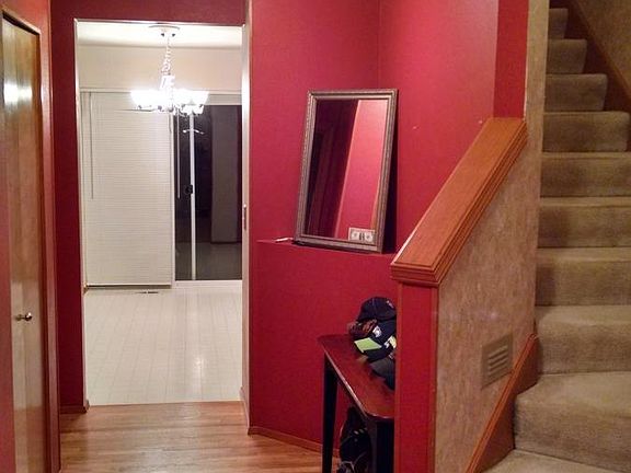 Entryway with hardwood floors