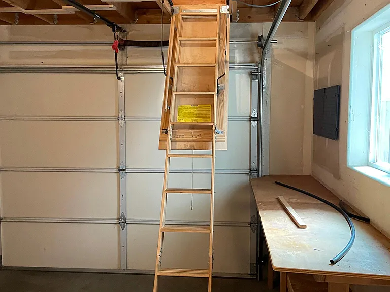 Loft storage space above garage