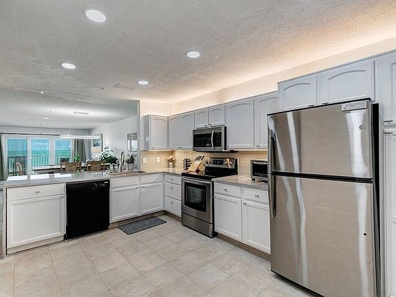 5th image of 13500 Gulf Blvd APT 205