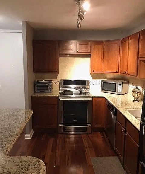 Kitchen w/ SS appliances & LOTS of cabinets