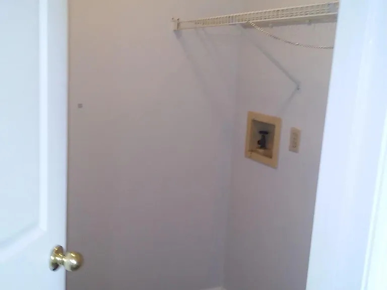 Laundry room with access from kitchen