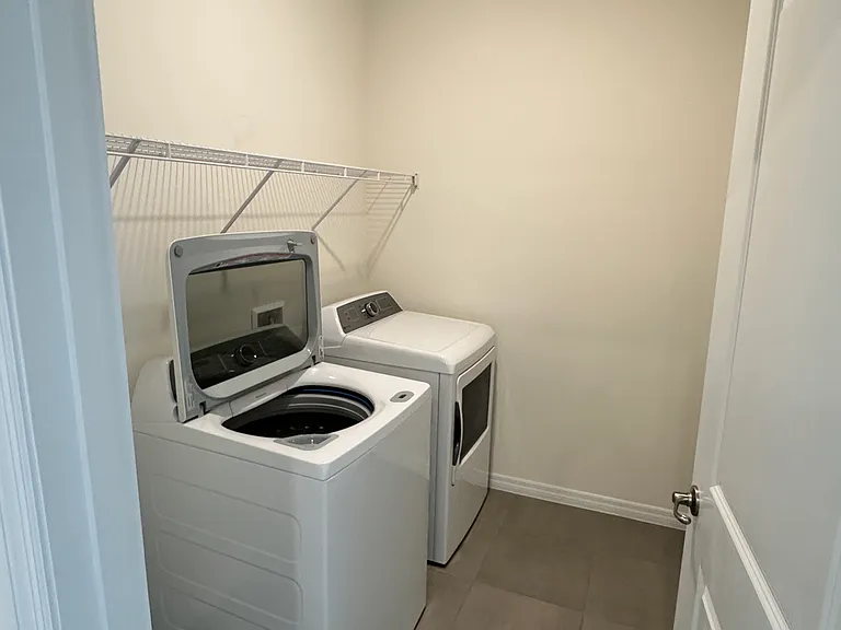 Laundry room with washer and dryer.