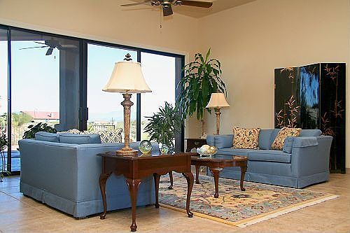 FORMAL LIVING ROOM W/MOUNTAIN VIEWS.