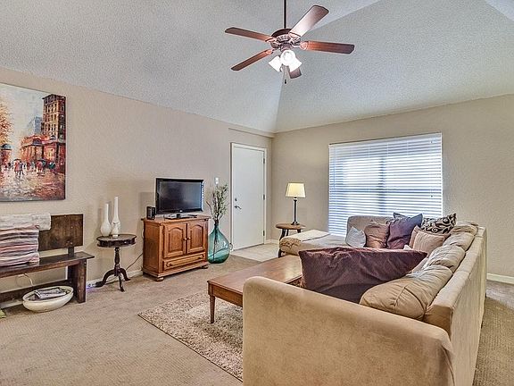 Living Room w/ Vaulted Ceiling