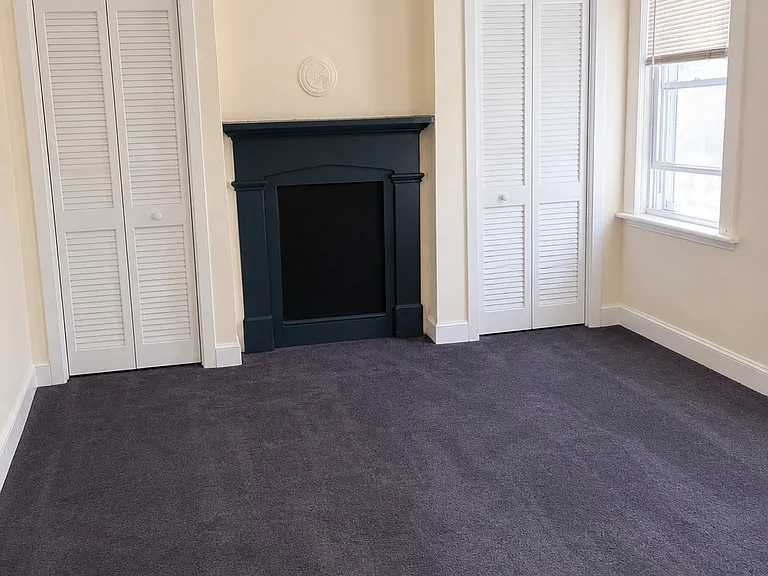 Bedroom number two with 2 closets on the second floor.