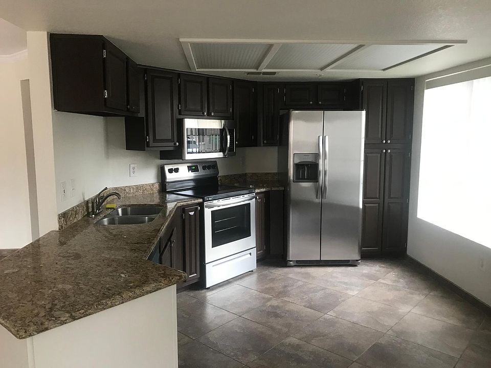 1st image of 9690 N 94th Pl Unit 118