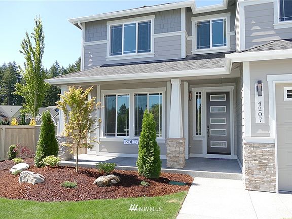 2nd image of 4207 Bogey Drive NE Lot34