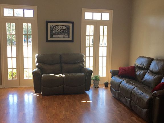 Living w/o curtains or rug