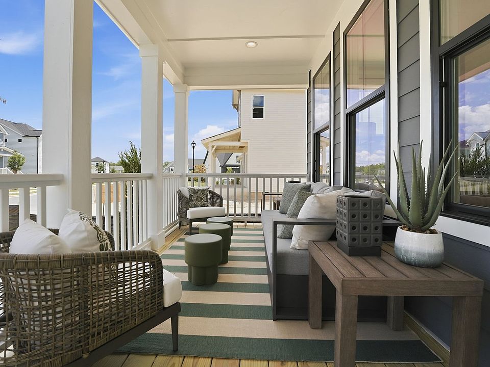 The screened porch of the Aiden single family home by Brookfield Residential at Wendell Falls.