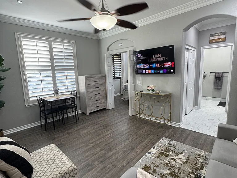 Bright, open living and dining area featuring a modern design, recessed lighting, a ceiling fan and fresh and relaxing atmosphere.