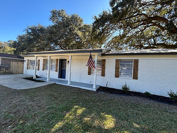 Trees over house will be pruned back.