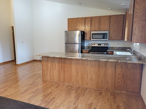Another view of the kitchen area