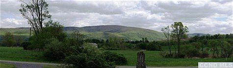 Panoramic view from the front yard, facing the protected Taconic Range.  The Berkshires are on the other side of those mountains.