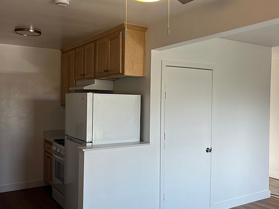 kitchen, door to den