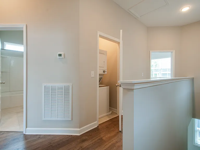 Laundry is conveniently located on the upper floor where the bedrooms are.