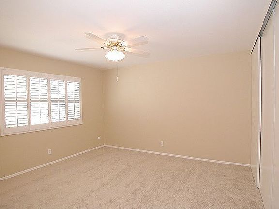 Master with new carpet, apint. Love the plantation shutters!