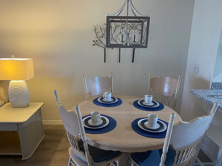 Dining Room sits 4 but there is another leaf for the table if needed.