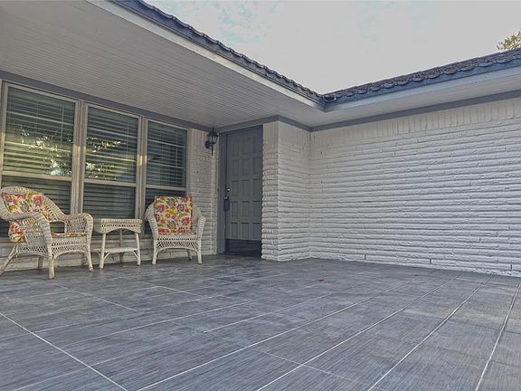 Grand front patio with designer tile!