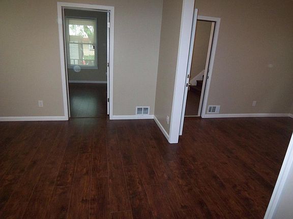 Livingroom with View into Bedroom, Dining Room and Entryway