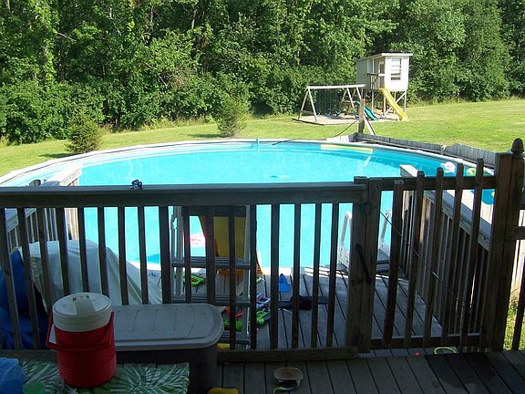 33' Dia. Pool adjoins large deck and is a favorite with the kids.