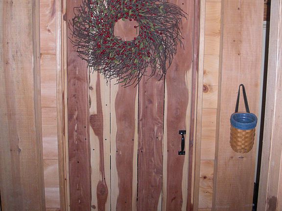 Door to downstairs half bath