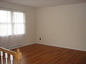 Living Room w/ gleaming hardwood floors