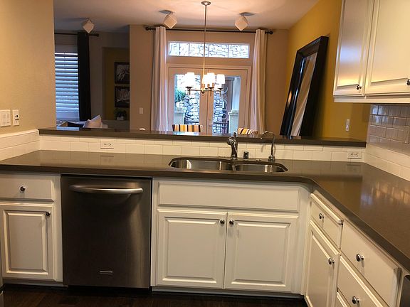 Kitchen with KitchenAid appliances (dishwasher, refrigerator, oven, microwave, etc.)