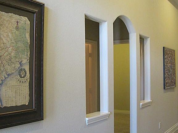 FRONT ENTRY LOOKING TOWARD DEN.