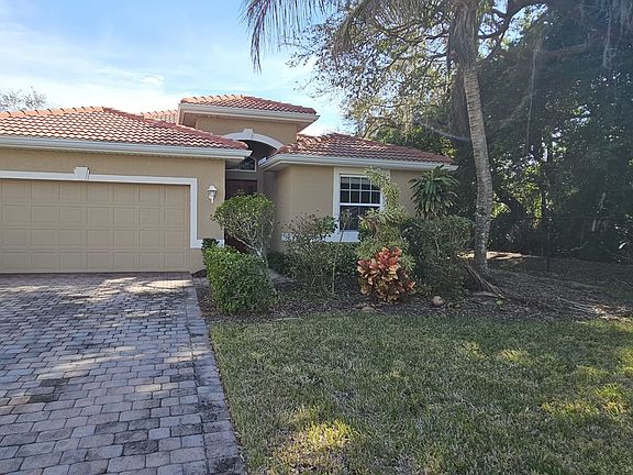 2 Car Garage with extra parking in driveway