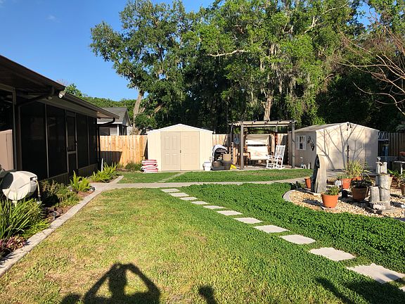 His and her sheds with patio