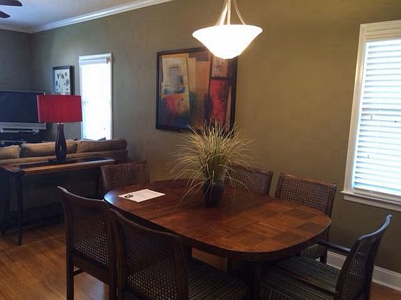 Vintage dining table with additional leaves for more seating.