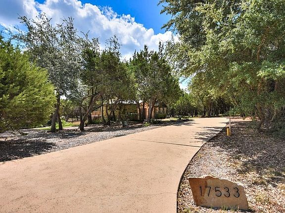 Long driveway, house tucked back at the end of a nice cul de sac.