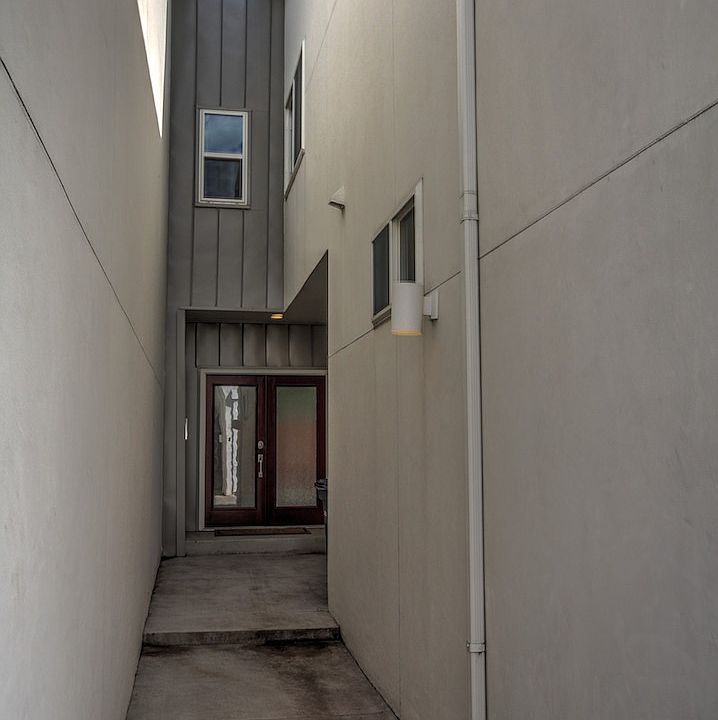 Well lit private entry with French door full-light door.